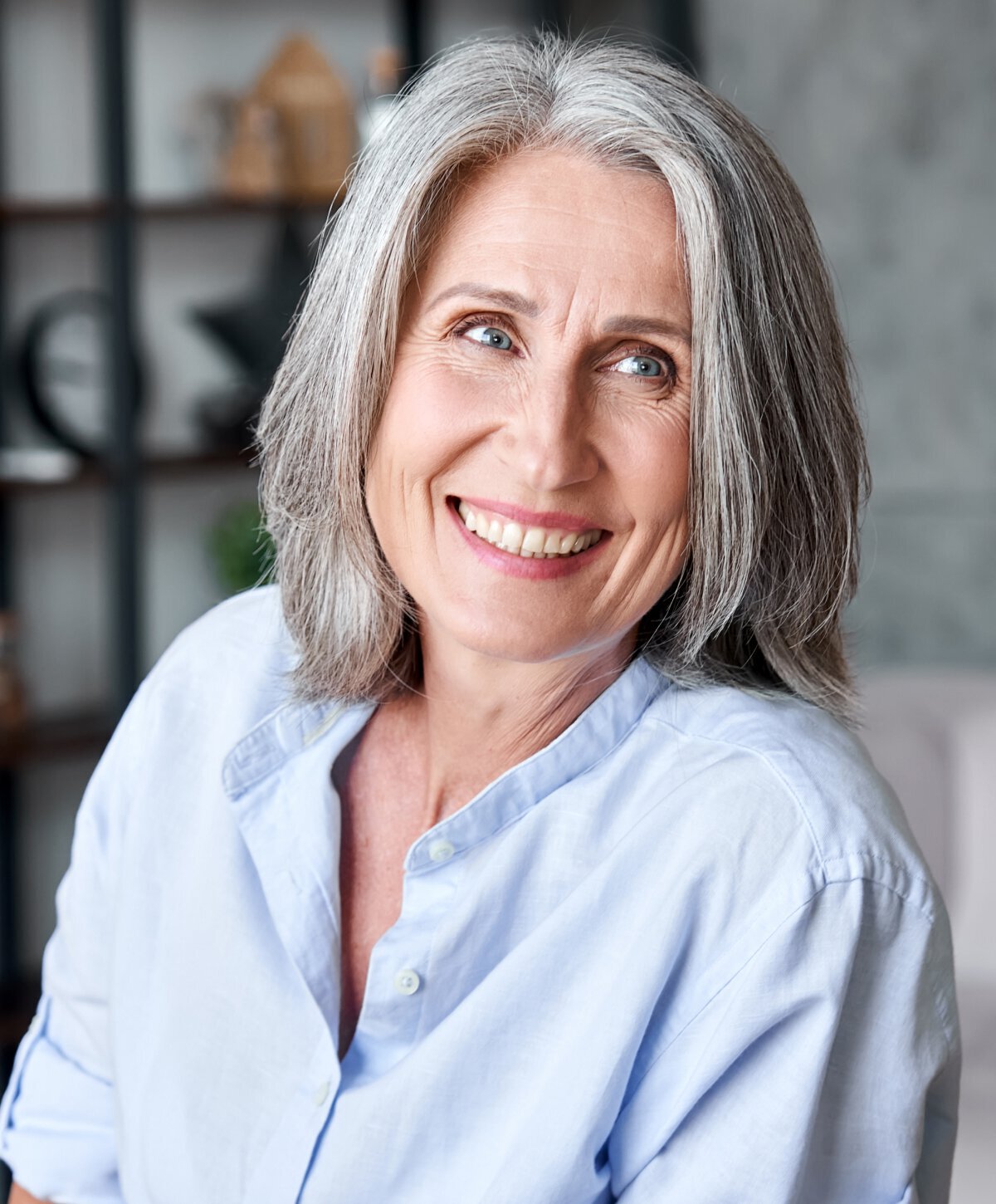 Full Mouth Reconstruction patient model smiling broadly